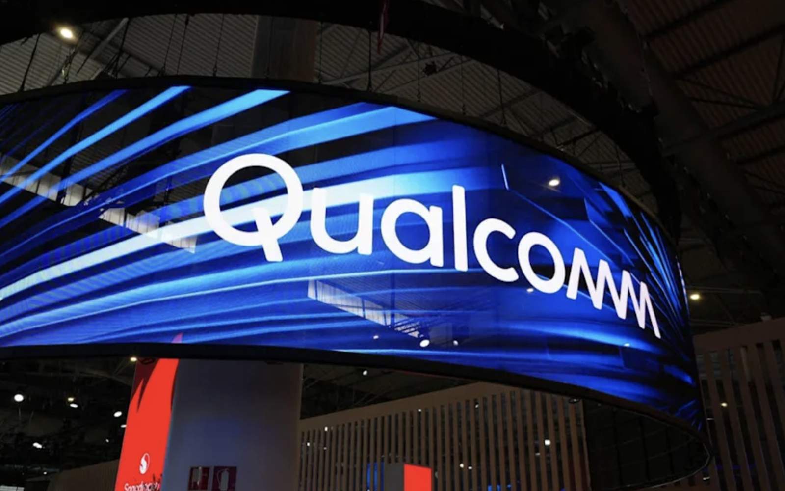 Financial charts and technical indicators overlapping a modern Qualcomm processor, representing in-depth Qualcomm stock analysis and semiconductor industry trends