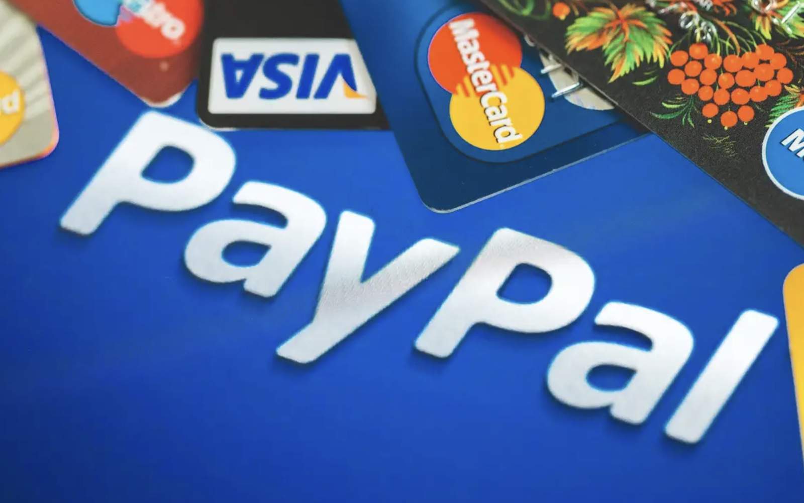 Smartphone displaying digital wallet interface reflecting the PayPal turnaround strategy and financial margin analysis